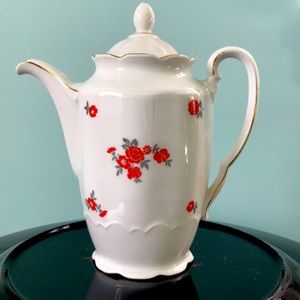 China/porcelain tea pot. Orange flowers.